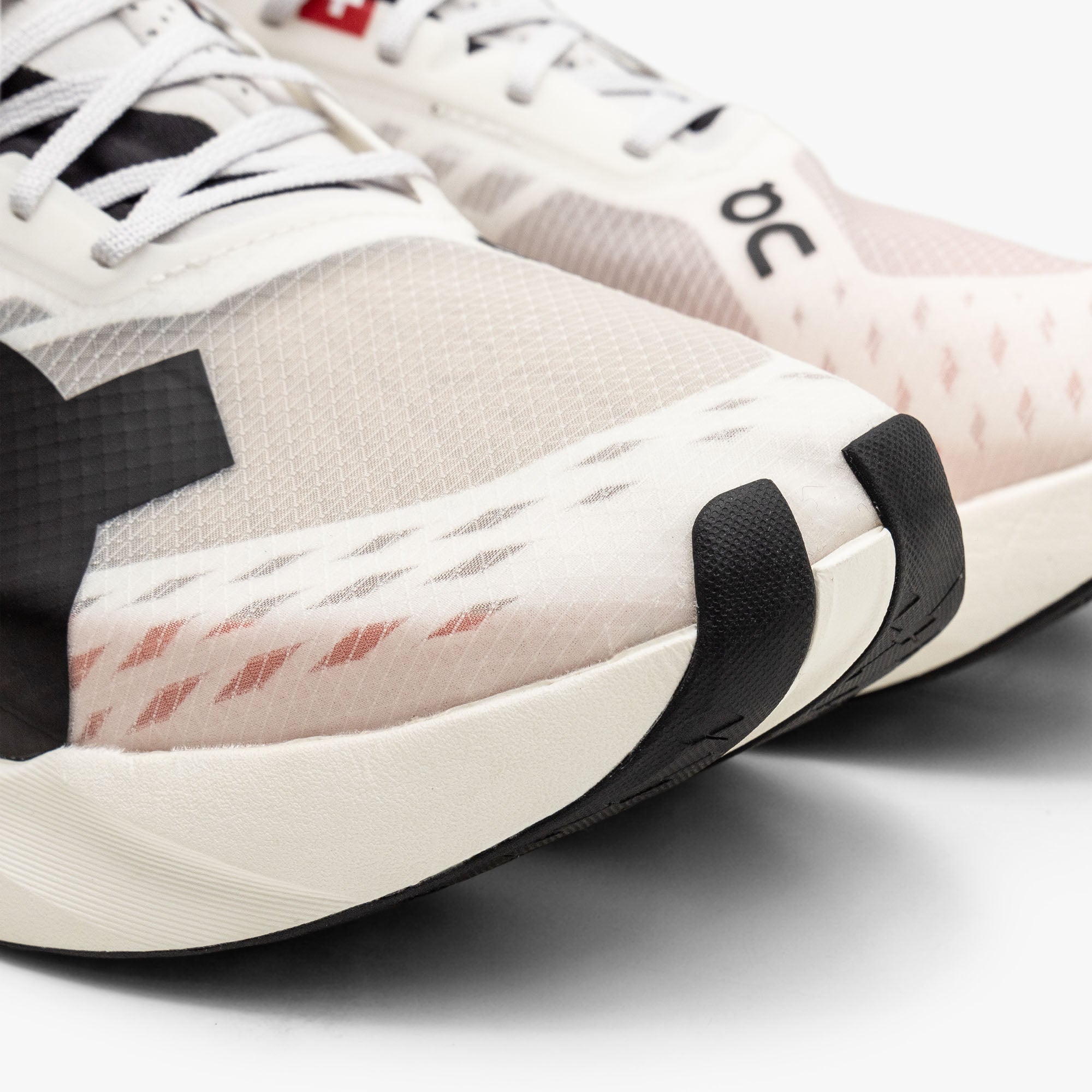 On Cloudboom Strike 1 / White / Black